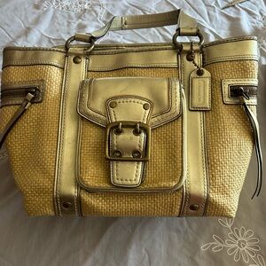 Coach Tan Straw Woven Legacy Purse with Gold leather Trim and Front Buckle
